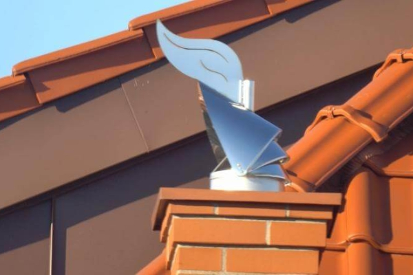 Hvordan monterer jeg en aspirotor til skorstenen?